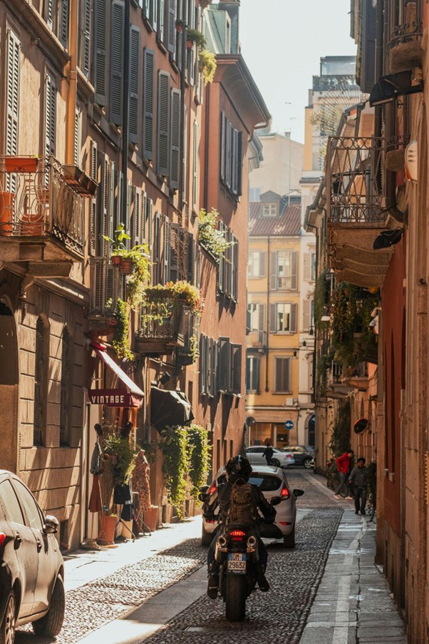 Picturesque cobblestone street in the Brera district of Milan, showcasing the neighborhood's artistic charm and classic Italian atmosphere.